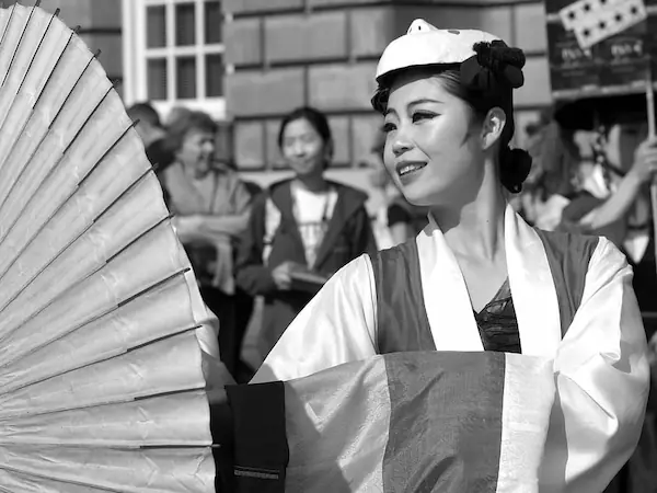 A performer gives visitors a flavour of the Far East