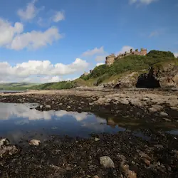 Culzean Castle perched on a cliff overlooking the Ayrshire coastline.