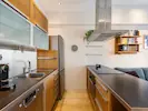 A large kitchen with abundant counter space, designed to make cooking a pleasure.