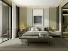 A spacious bedroom featuring low, retro-inspired furniture and high ceilings, creating a stylish and airy atmosphere.