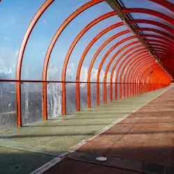 The colourful Smartie Tube bridge in Glasgow, showcasing vibrant colours and a playful design.